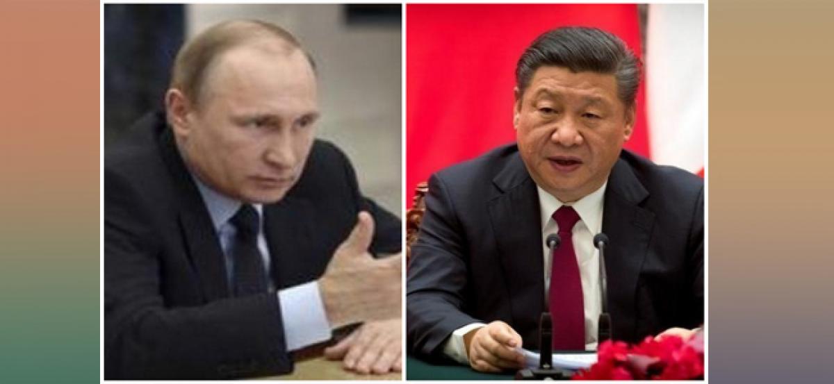 Xi gifts Putin Chinas friendship medal