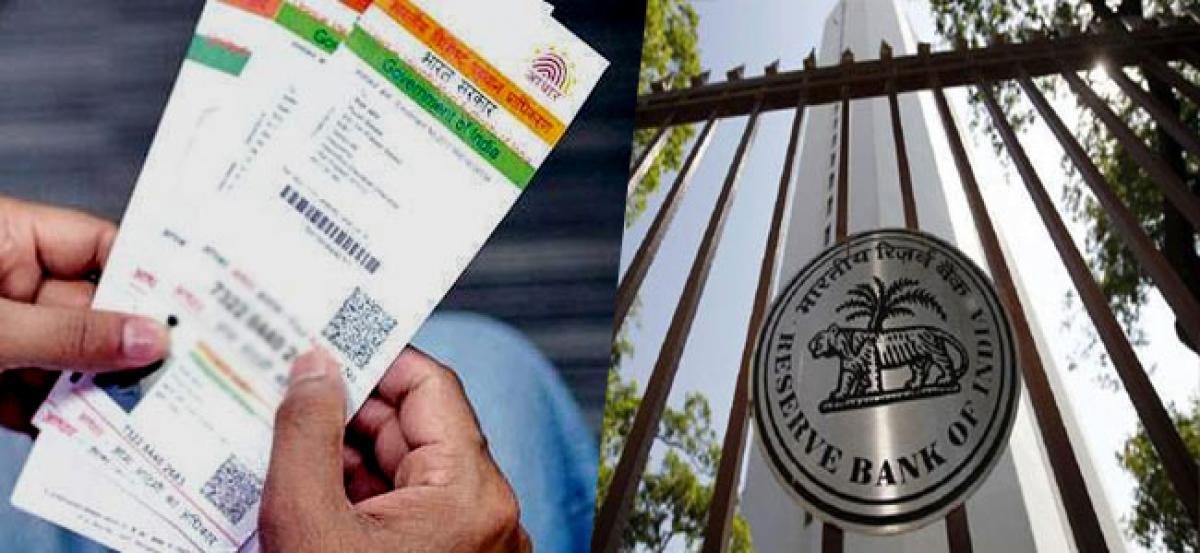 Linking Aadhaar number to bank accounts mandatory, says RBI