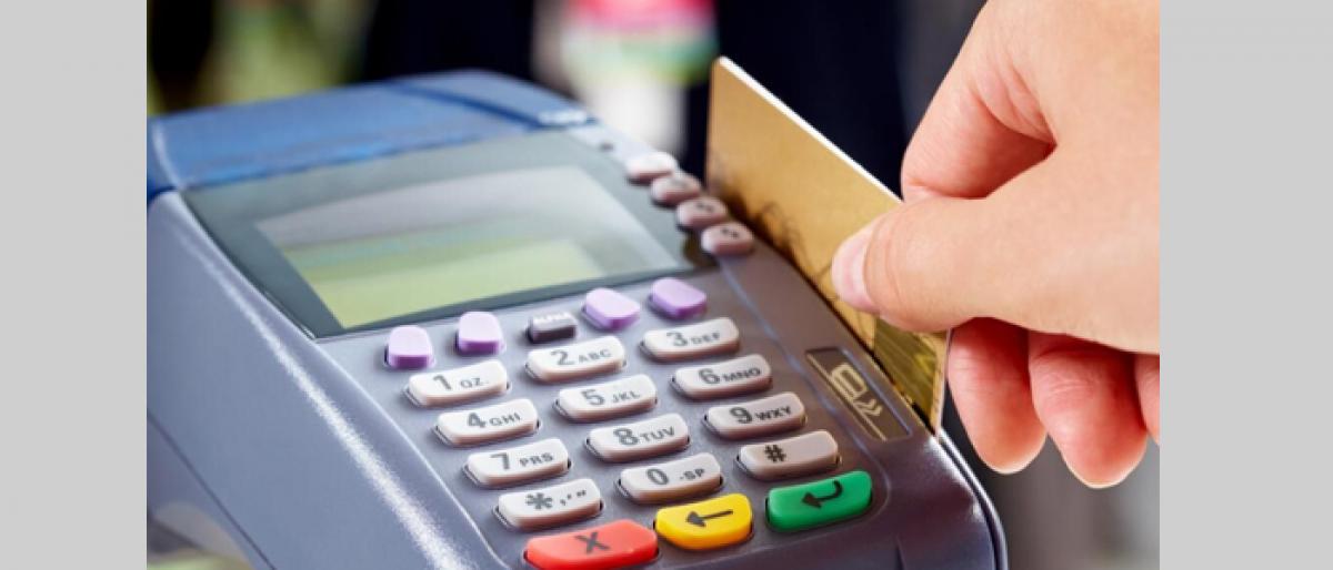 RBI rationalises charges on debit cards