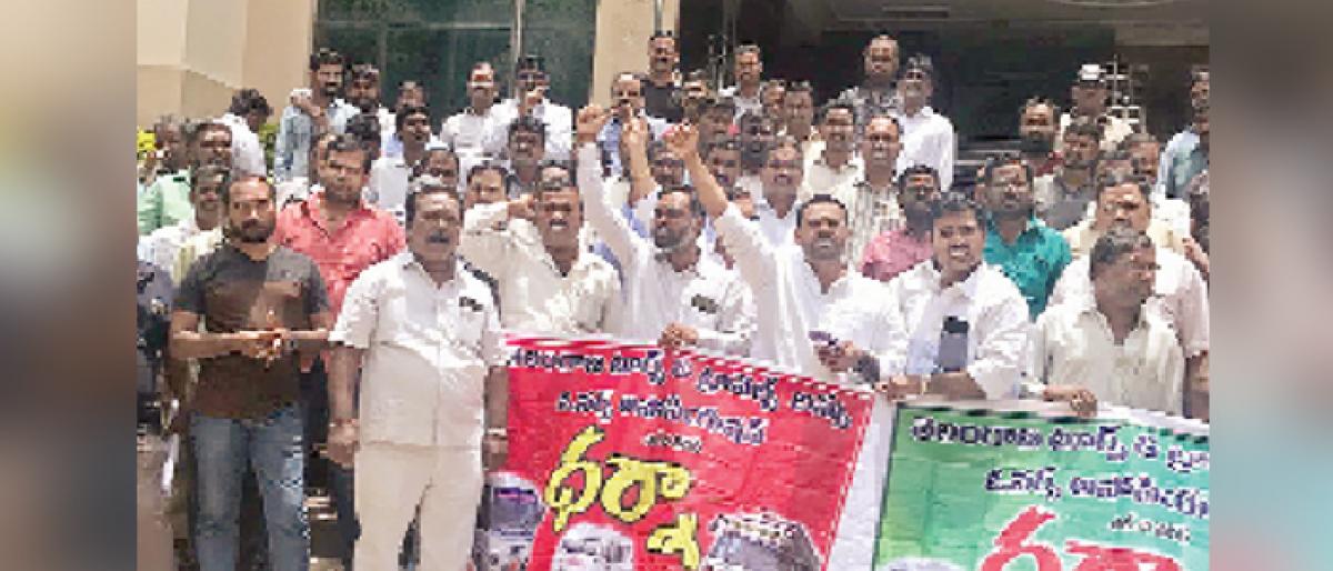 Bus operators stage dharna at RTA office in Khairatabad