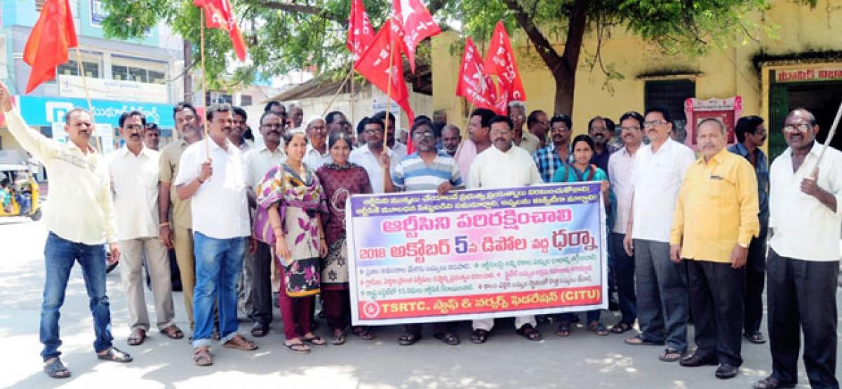 RTC workers seek more funds; stage dharna