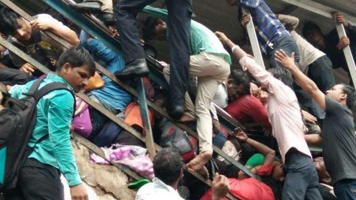 Western Railway probe blames heavy rain for Elphinstone stampede