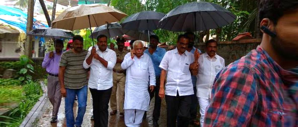 Minister R V Deshpande visits rain-hit areas in Mangaluru