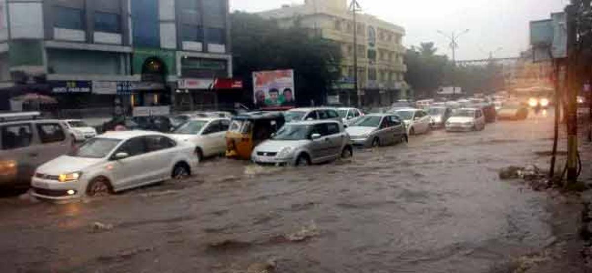 Heavy Rain Lashes Hyderabad: City Roads Inundated