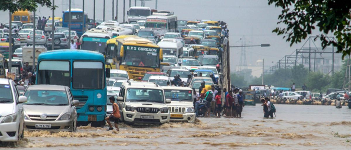 Rains lash Delhi, stall traffic