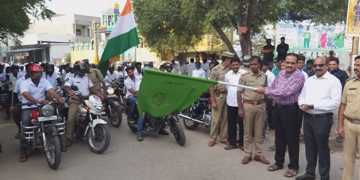 Helmet awareness rally held in Kadapa