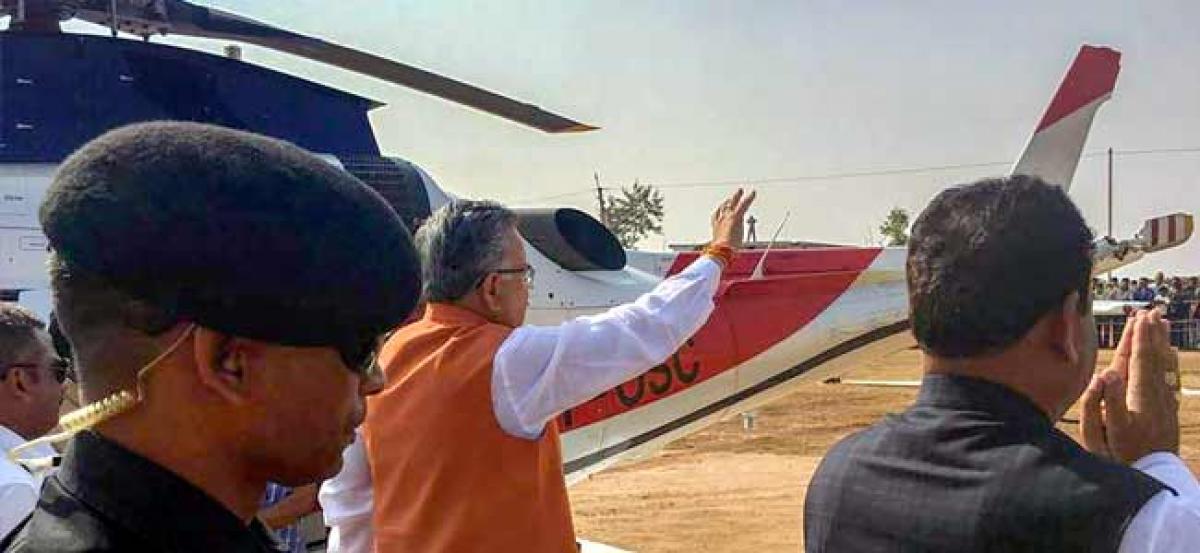 On campaign trail, Raman Singh greeted with moniker Mobile wale baba for giving free smartphones