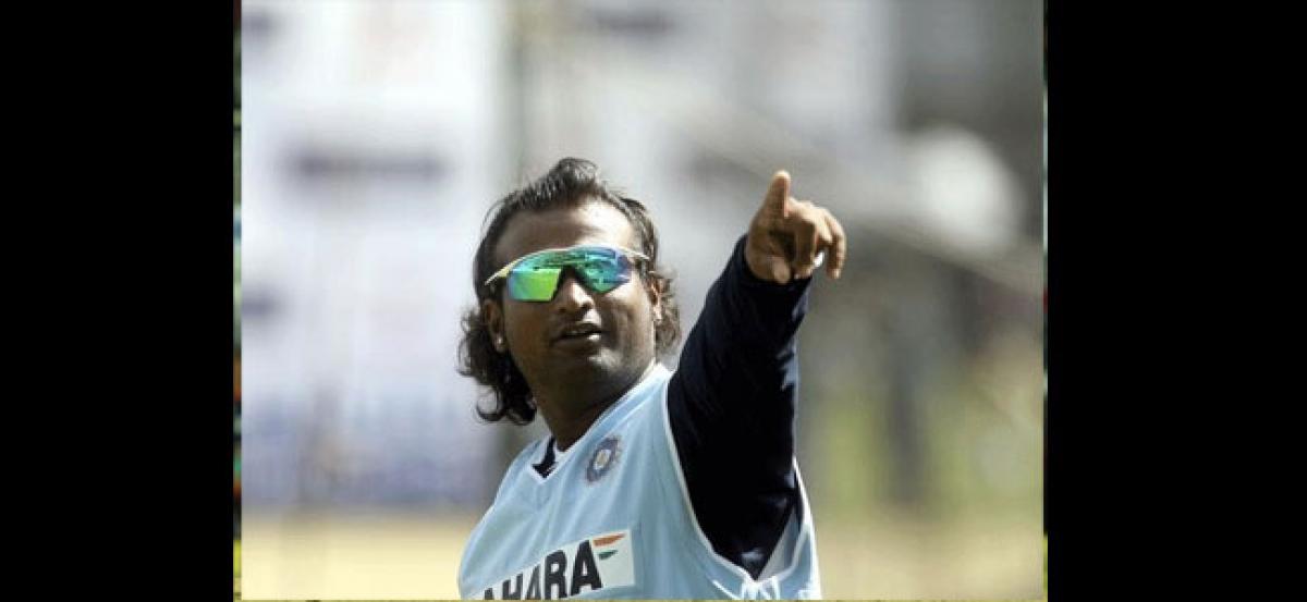 Happy with new role: Ramesh Powar