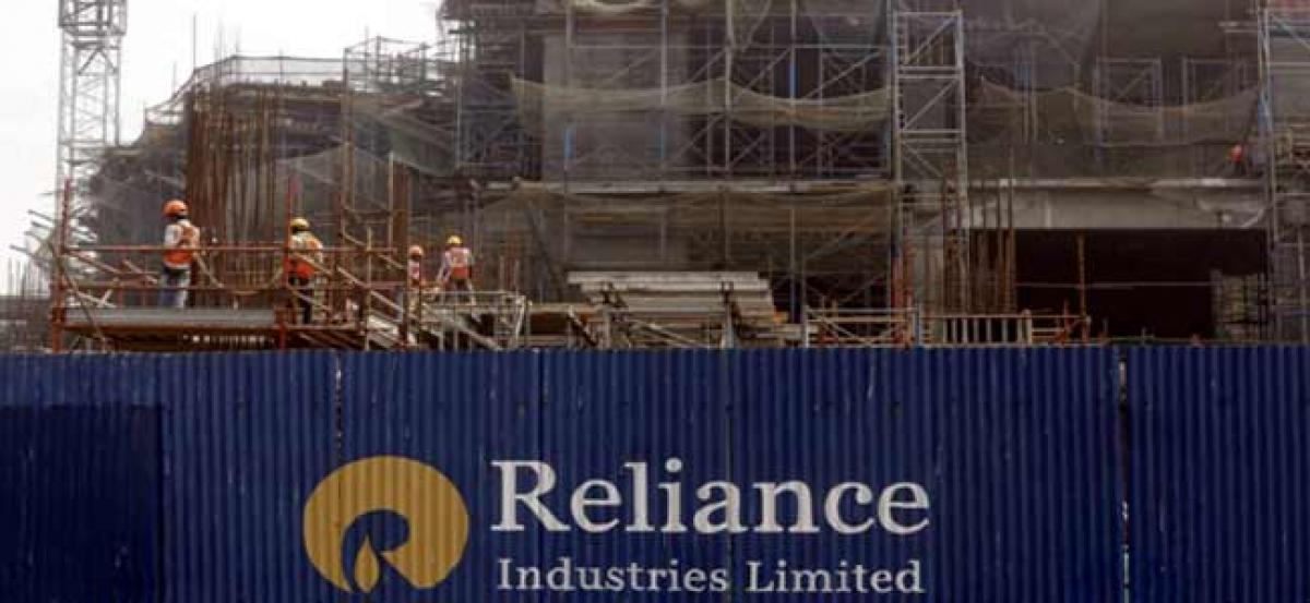 Reliance shares slide on debt, delay in key project