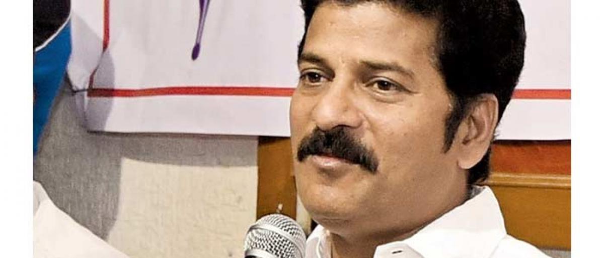 Revanth Reddy sees KCR-Adani nexus in CG power deal