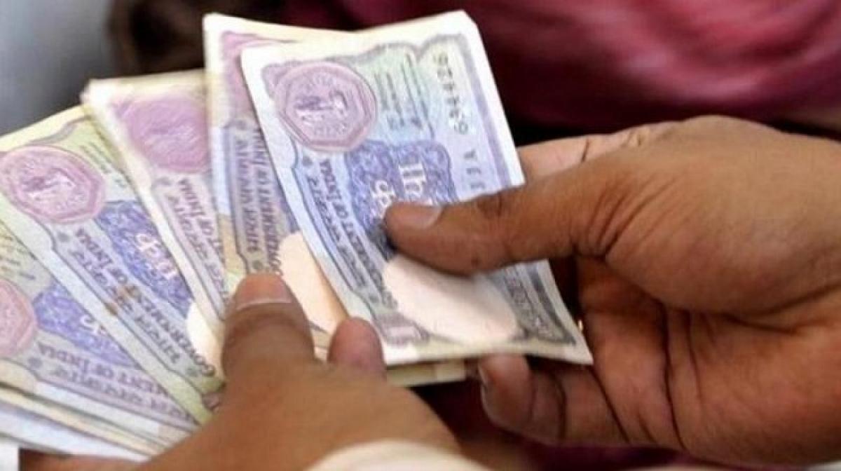 Rupee hits record low, mild RBI intervention seen