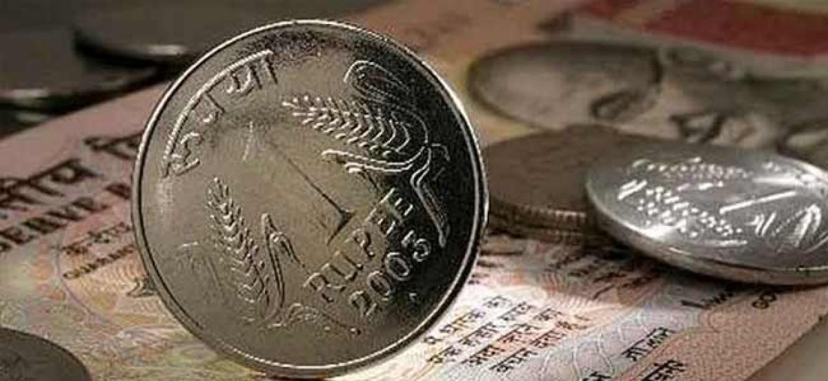 Rupee falls 14 paise against US dollar in opening trade