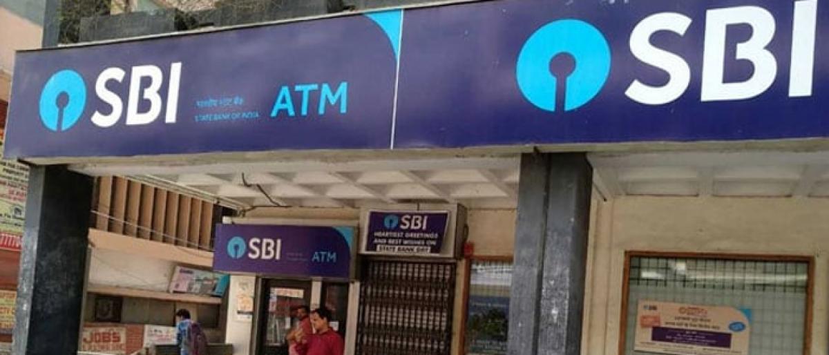 SBI halves daily ATM withdrawal to 20,000