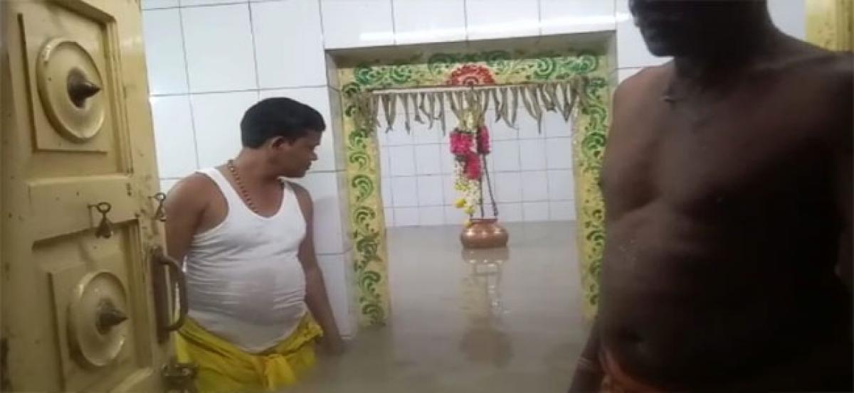 Pathancheru Villagers submerge Siva Lingam for rains