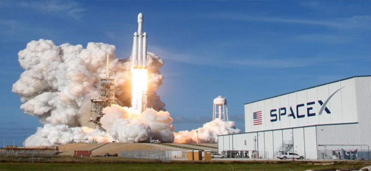 SpaceXs Falcon Heavy rocket soars in debut test launch