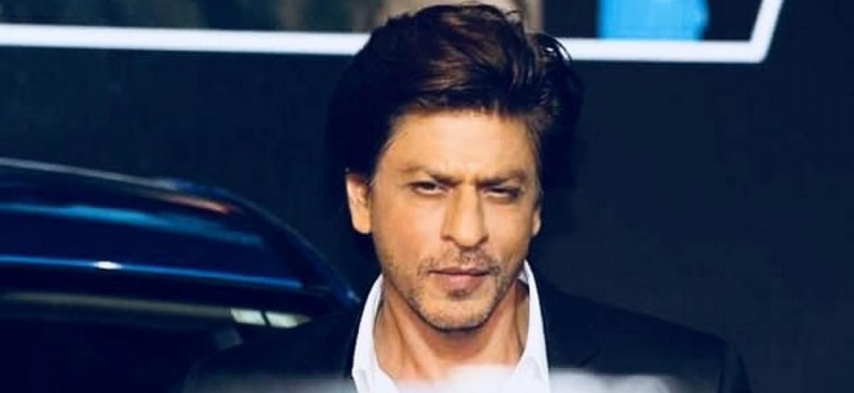 Shah Rukh Khan claims to be growing up very fast into a child