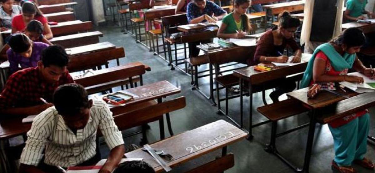 Principal, teacher involved in helping students with answer slips in SSC exam hall; held