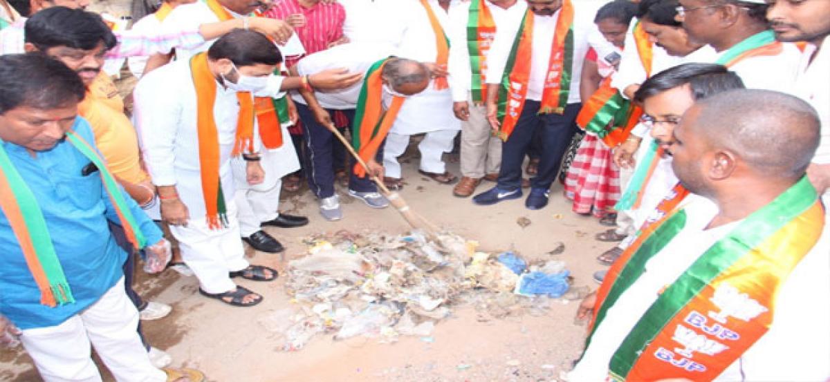 Laxman bats with broom