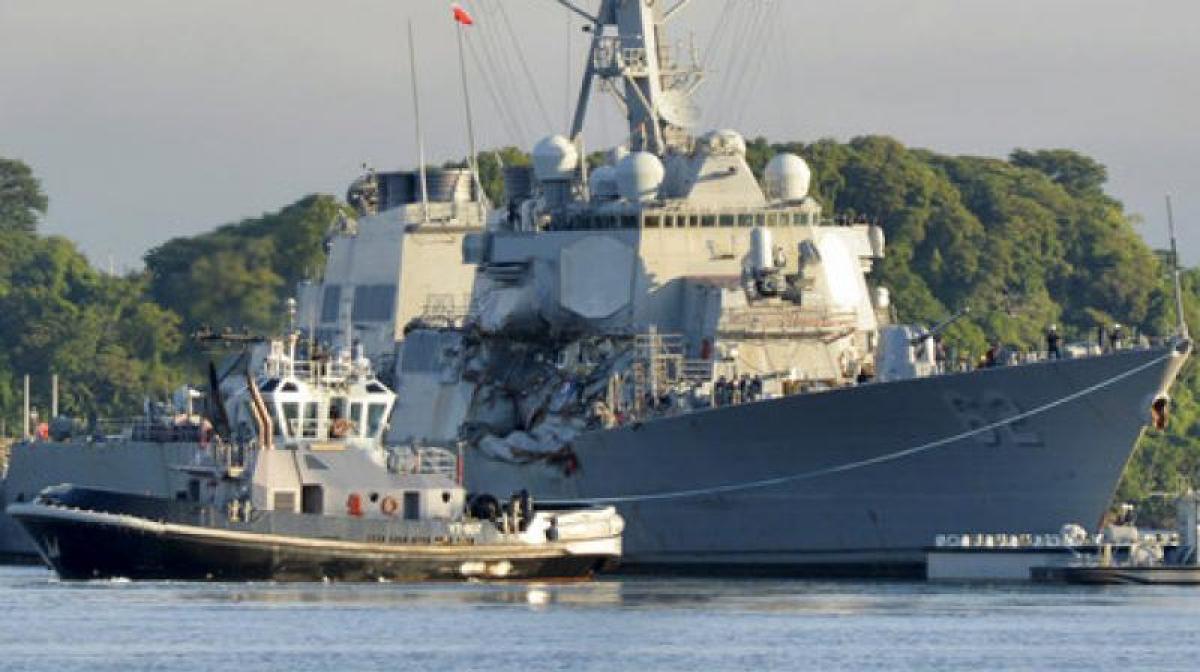 10 US sailors missing after destroyer collides with merchant ship