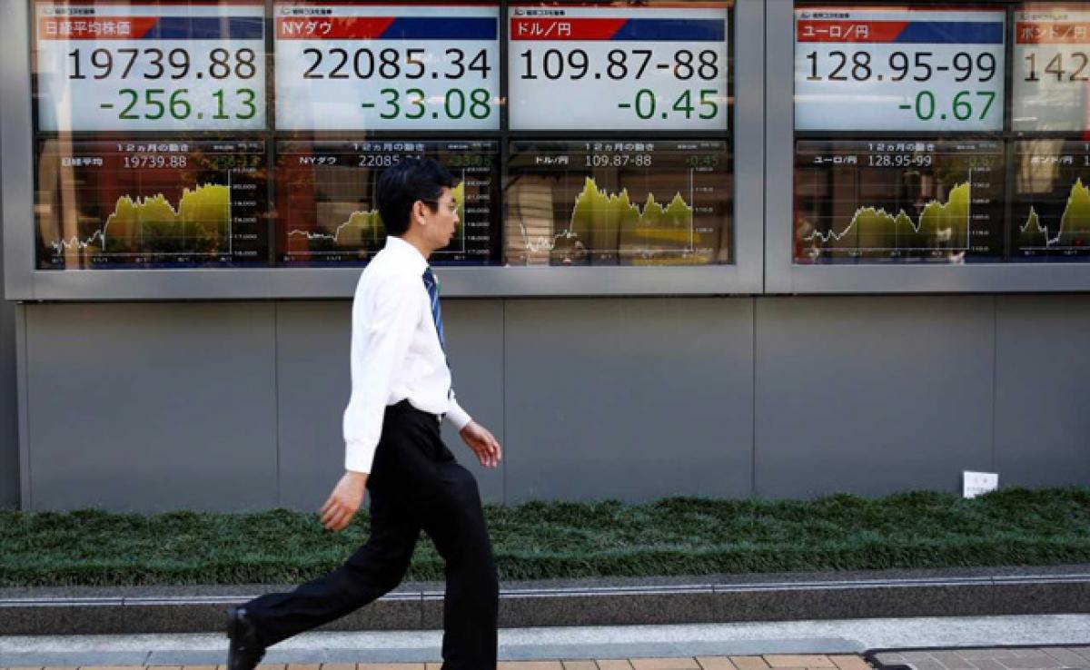 Asian Shares Hold Firm, Oil Elevated As Iraq Tensions Escalate