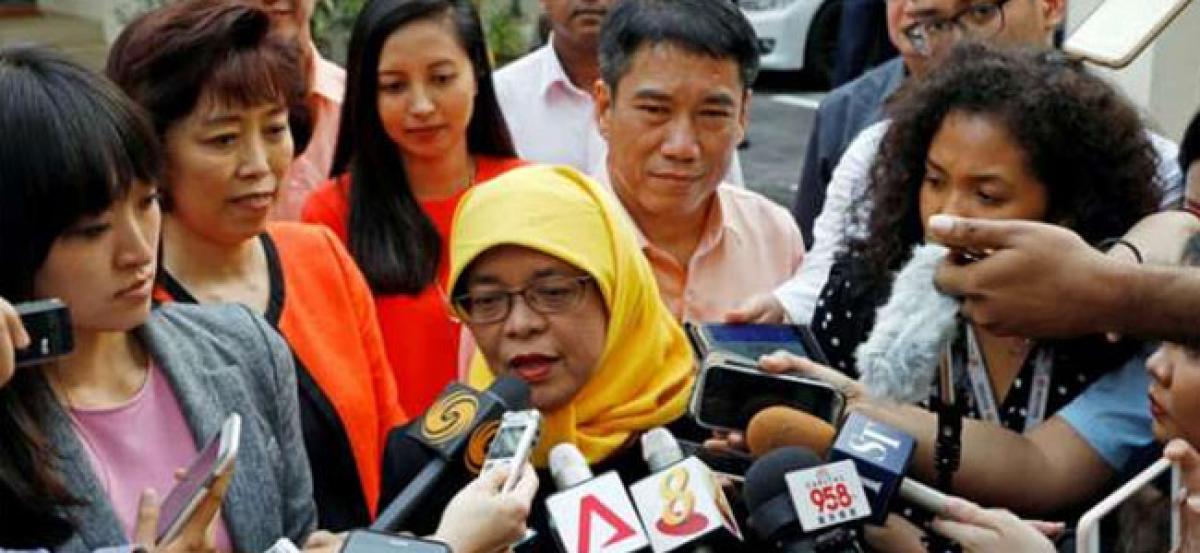 Singapore: Halimah Yacob becomes city-state’s first woman president