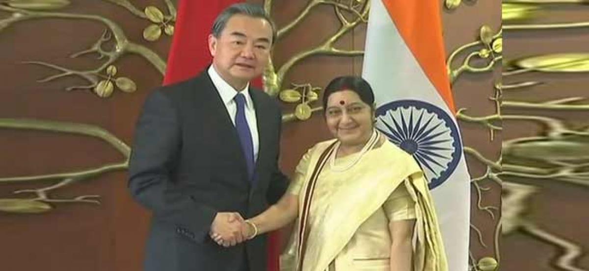 Sushma Swaraj meets Chinese Foreign Minister Wang Yi