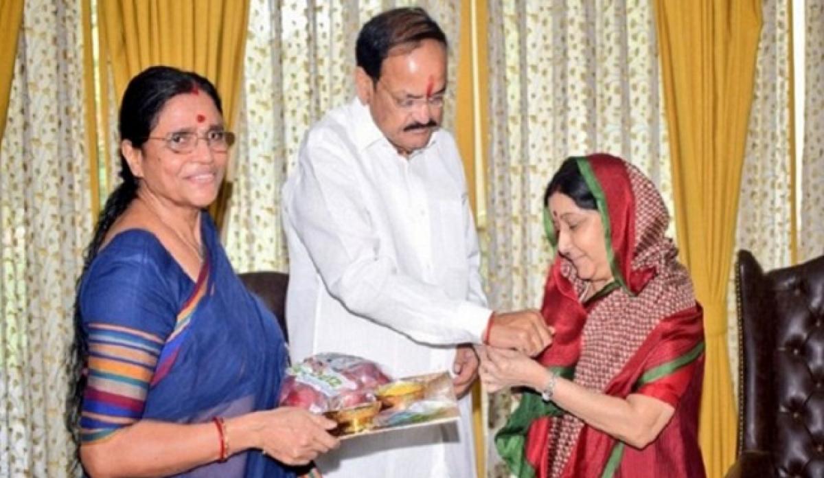 Raksha Bandhan: Sushma Swaraj ties rakhi to Venkaiah Naidu