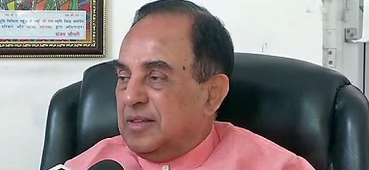 Swamy mocks Rahuls visit to Gujarat temple, asks him to declare whether he is Hindu or Christian