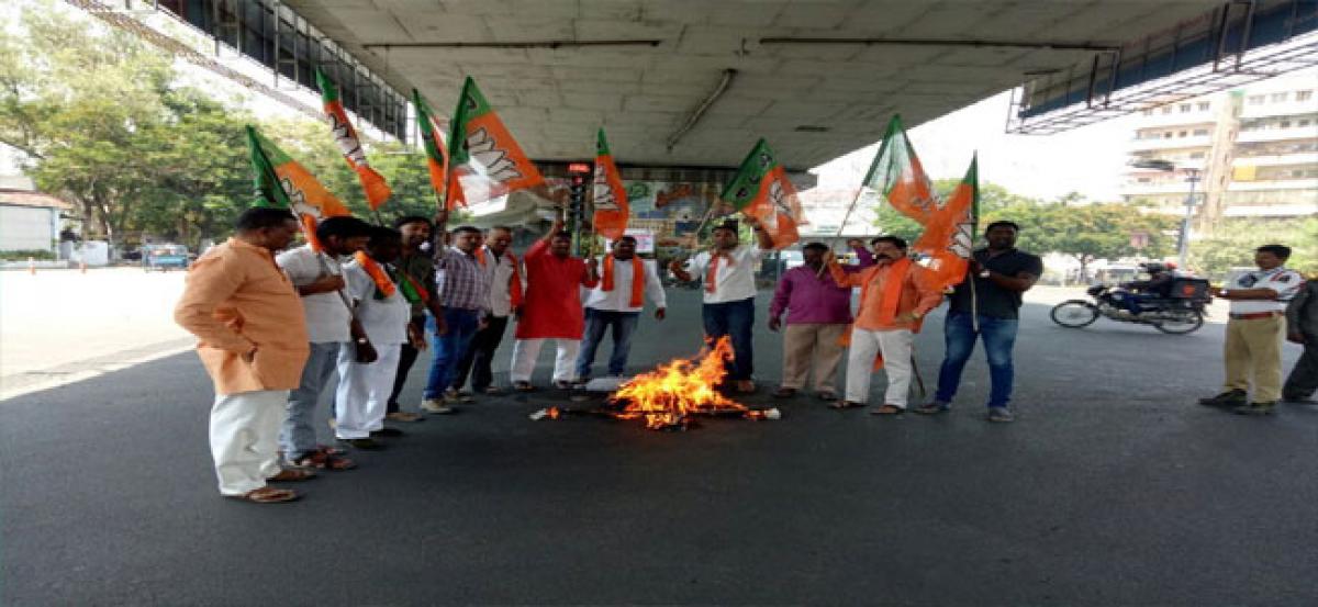 BJP members condemn Balakrishna’s remarks on Modi, burn effigy