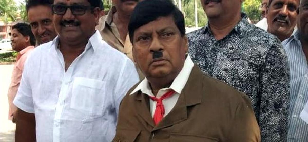 TDP leader dons Hitlers look to protest over special status for AP