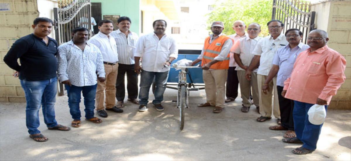 Three-wheeler handed over to GHMC worker