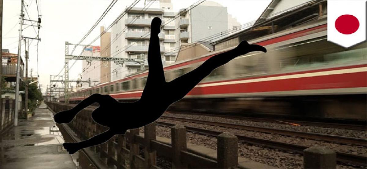 Man jumps before train