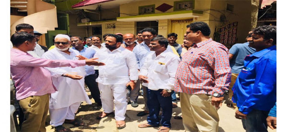 Manne Govardhan Reddy interacts with residents