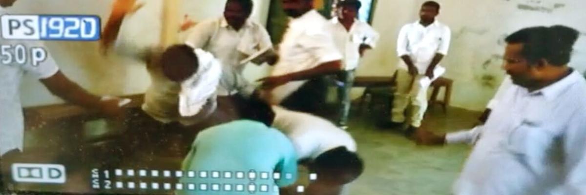 TRS workers thrash polling official in Huzurnagar constituency