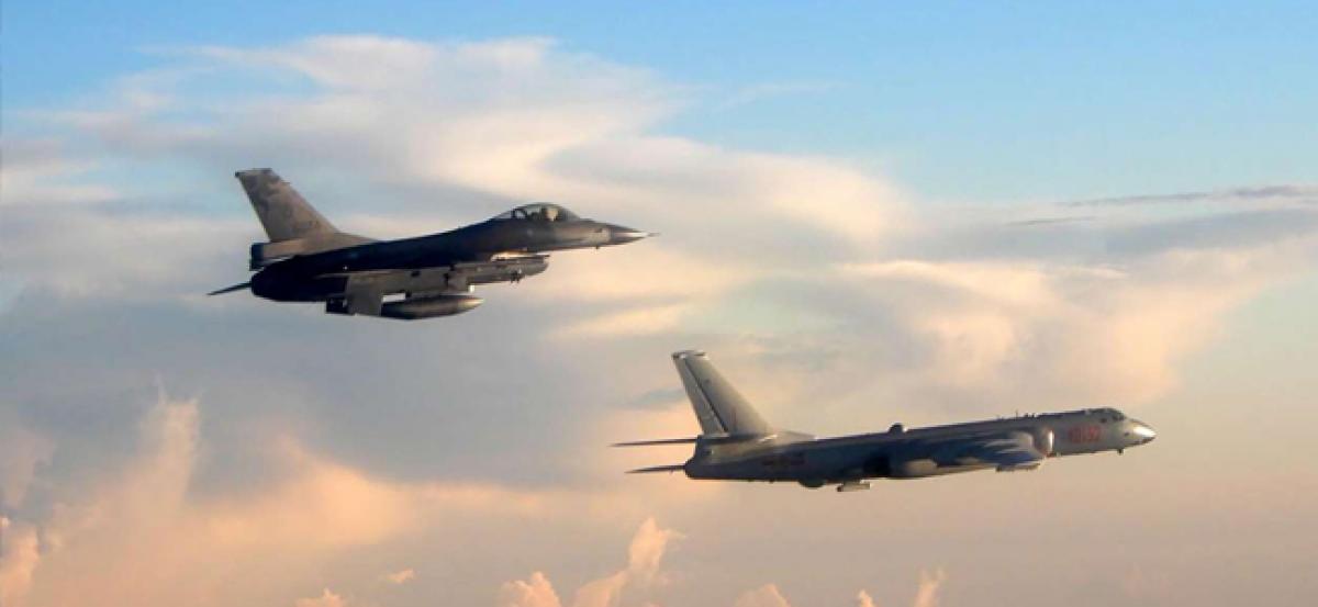 Not willing to be bullied by Beijing, Taiwan sends aircraft to shadow Chinese bombers around island