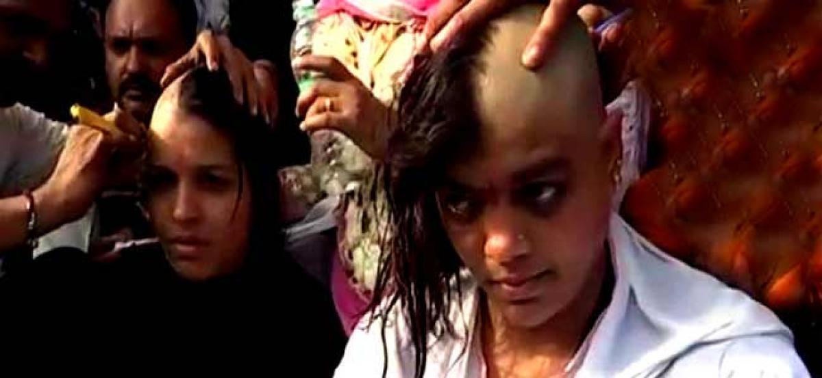 Teachers in Bhopal go bald in protest