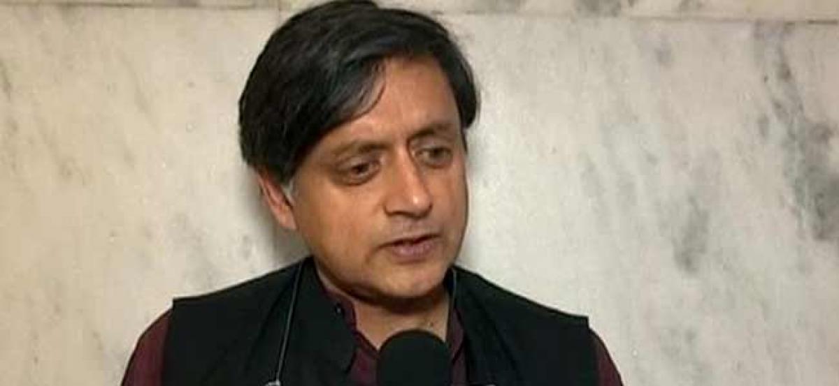 Disturbing to see PM Modis criticism being equated to insulting Gujarat: Tharoor