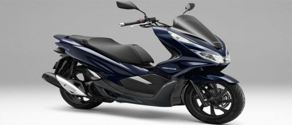 Honda PCX electric  & hybrid scooter launch  next year