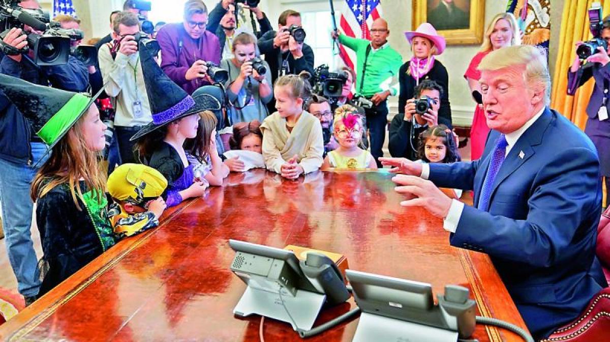 How does the press treat you, Donald Trump asks kids