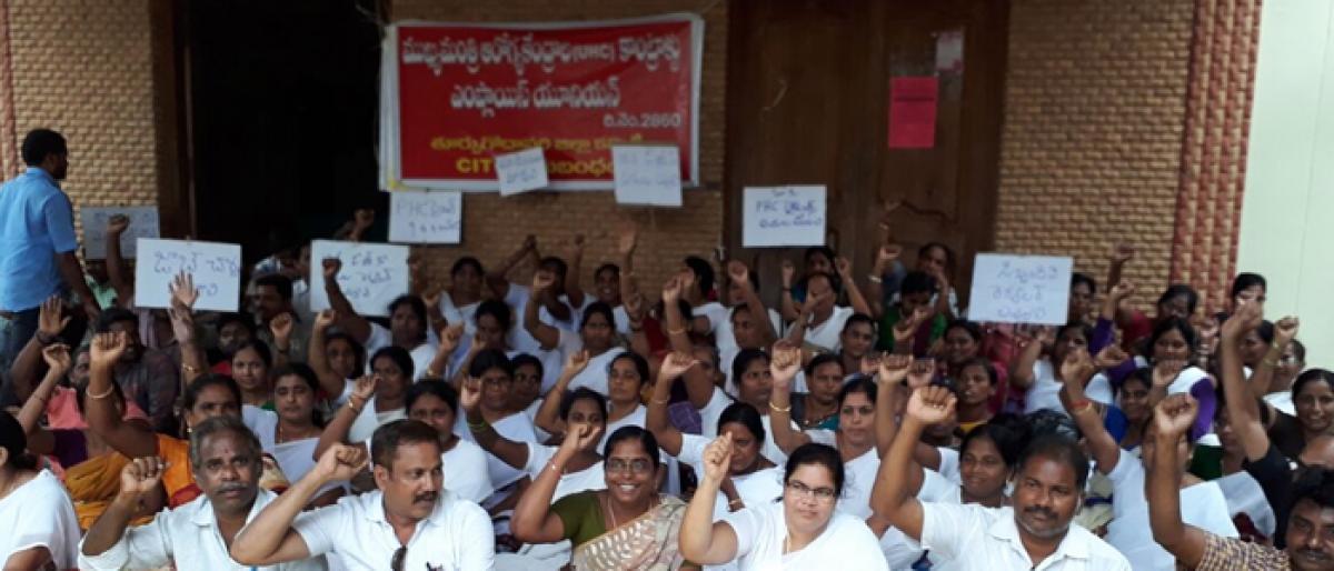 UHC contract staff stage dharna in Kakinada