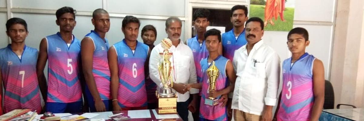 Satavahana team lifts volleyball trophy