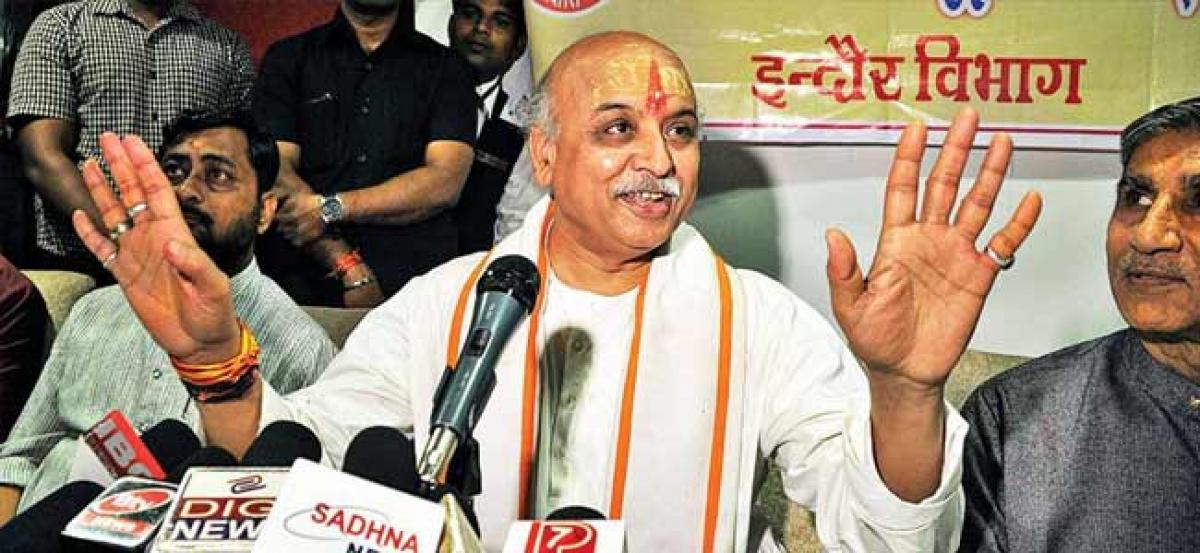 Pravin Togadia escapes unhurt as truck hits his car, leader says  Z-plus security was weakened deliberately