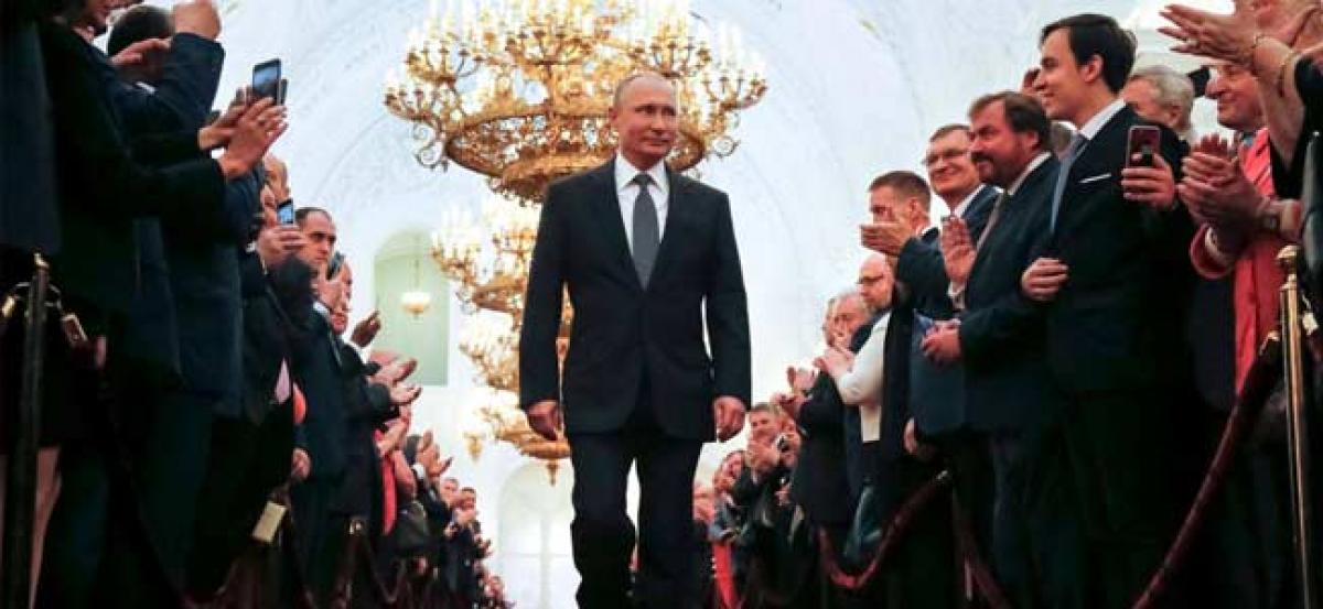 Vladimir Putin extends two-decade rule by another six years; wins 77% of Russian vote