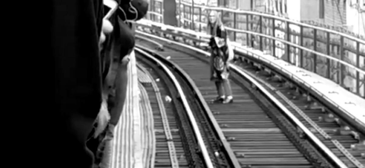 Woman Walks on Metro Rail Tracks, Trains Stopped