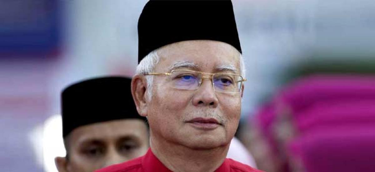 Malaysias embattled Najib questioned by anti-corruption agency