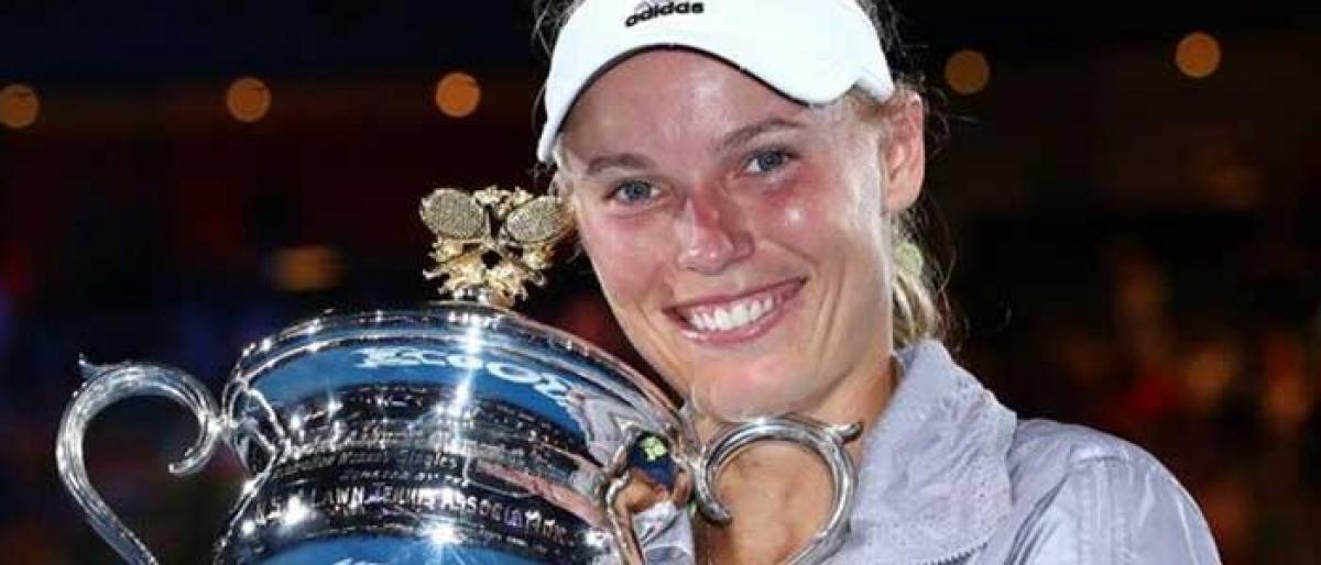 Champ Wozniacki is new World No 1