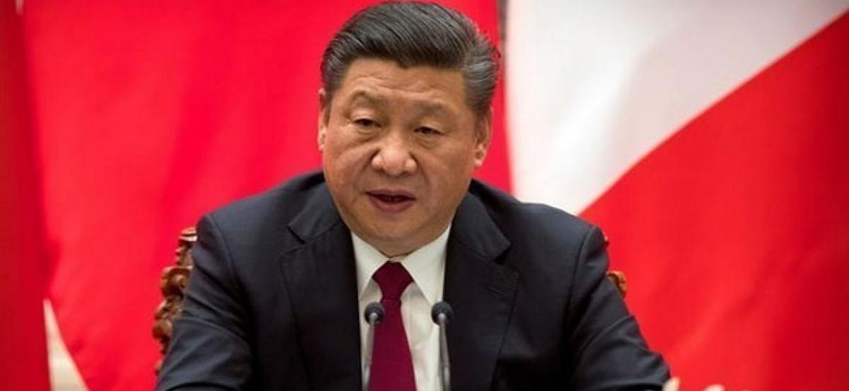 Xi Jinping secures lifetime presidency as lawmakers abolish term limits