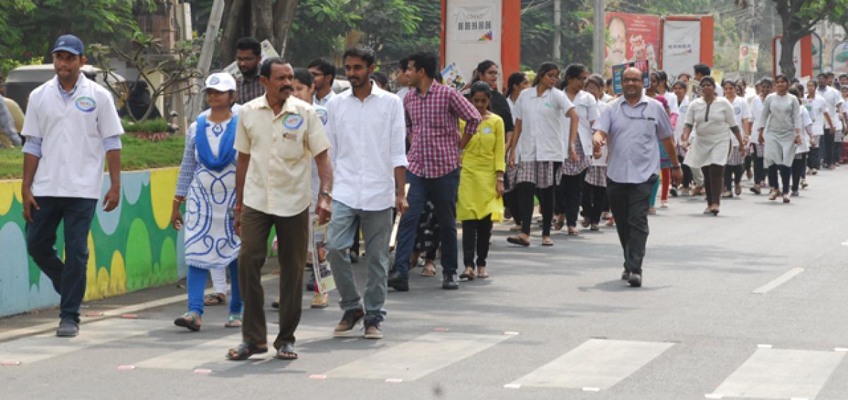 Sibar Dental College staff,  students take out awareness rally