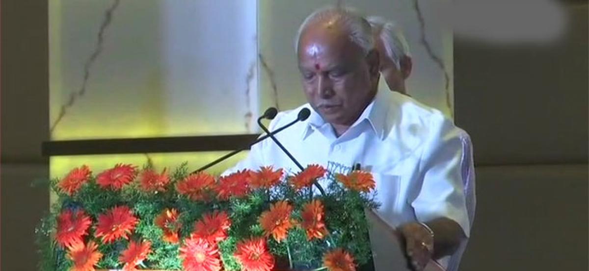 Yeddyurappa launches BJPs manifesto for Karnataka Assembly Polls