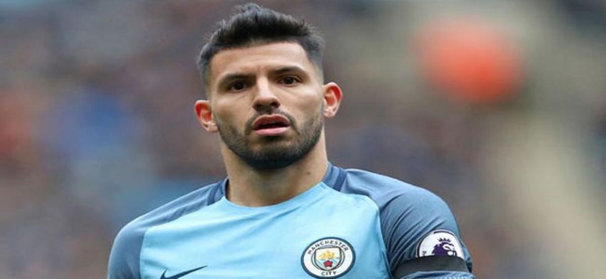 Aguero breaks rib in car crash